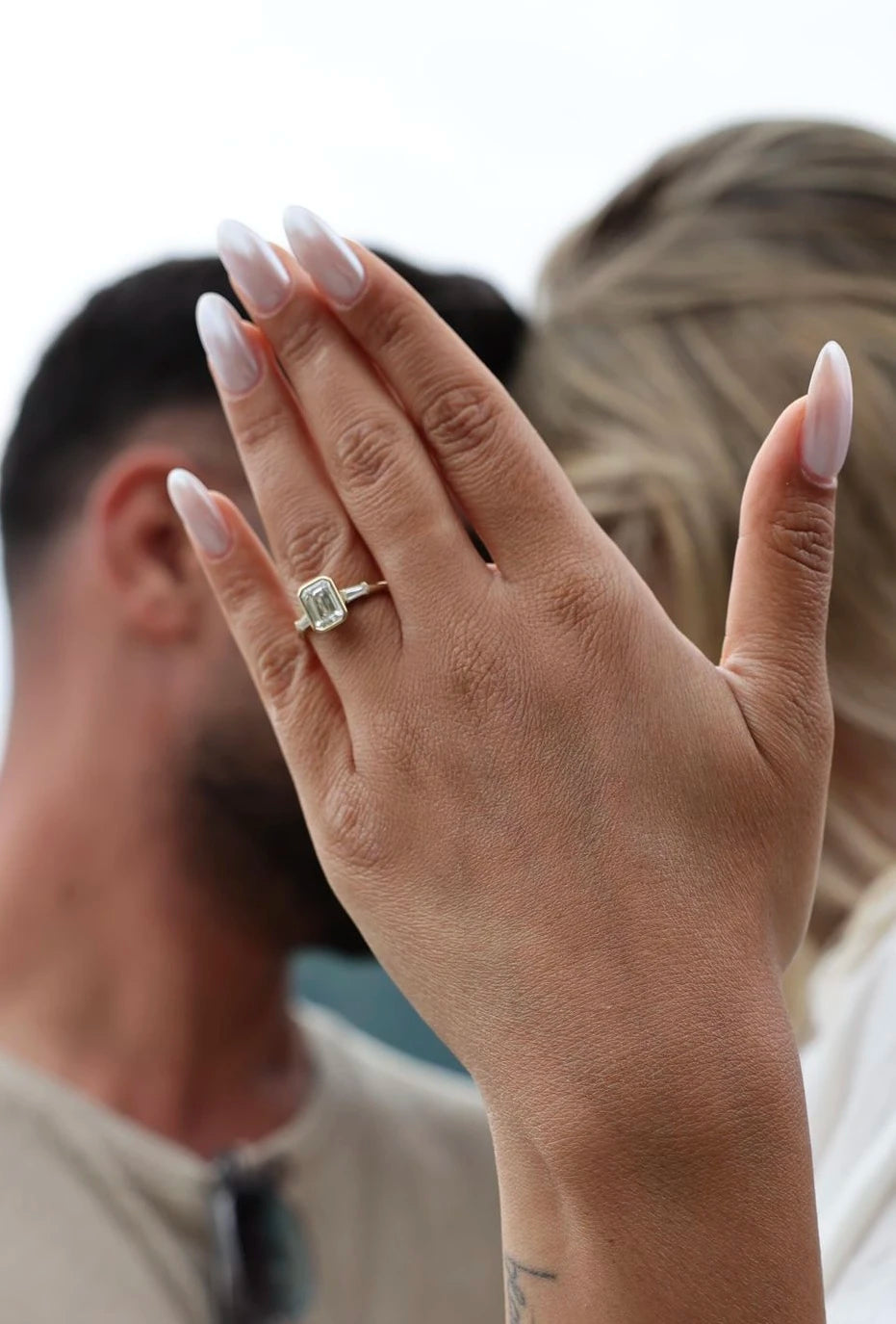 EMERALD & TAPERED BAGUETTE RING