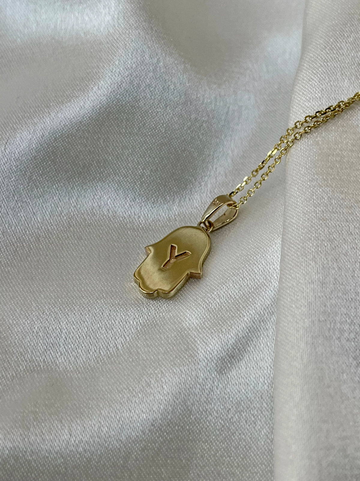 HAMSA NECKLACE WITH INLAID CENTER