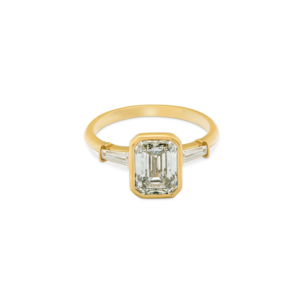 EMERALD & TAPERED BAGUETTE RING