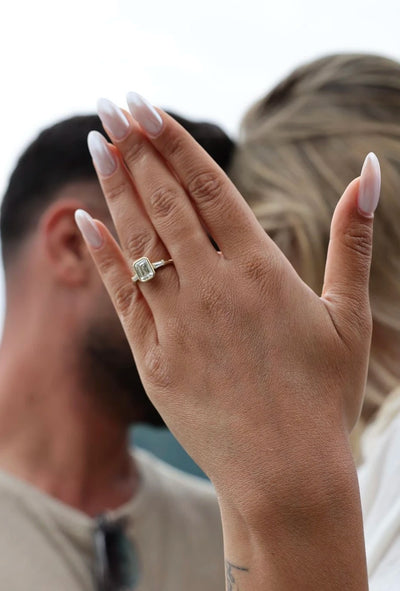 EMERALD & TAPERED BAGUETTE RING